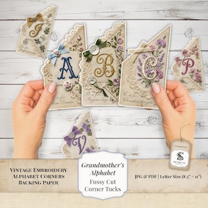 May include: A collection of vintage-style alphabet corner tucks featuring embroidered letters A, B, C, J, P, and V. Each piece includes floral motifs, lace trim, and small bows. The text includes phrases like A is for... Anno Domini, B is for... Bygone days, and C is for... Cherished thoughts.