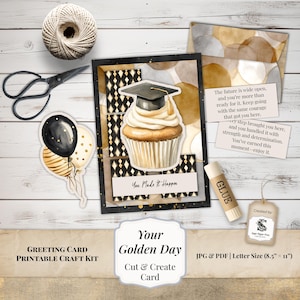 May include: A graduation-themed greeting card kit with a cupcake wearing a graduation cap. The kit includes a card, envelope, stickers, glue, scissors, twine, and balloons. The card says "You Made It Happen".