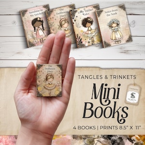 May include: A hand holds a miniature book titled "The Dollhouse Diary" in front of four other small books. The books feature illustrations of girls in dresses. The image also displays the text "TANGLES & TRINKETS" and "Mini Books".