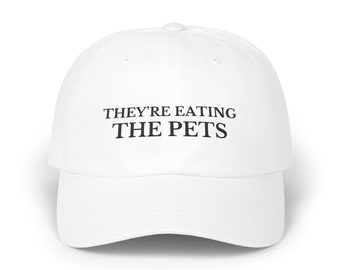 Theyre eating the pets embroidered Trump hat