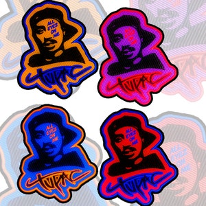 May include: Four embroidered patches featuring a portrait of Tupac Shakur. Each patch has a different color scheme: orange, pink, blue, and red. The patches include the text "ALL EYEZ ON ME" and "TUPAC" in stylized lettering.