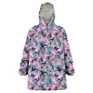 May include: A pink, green, and blue camouflage print oversized hoodie with a large pocket on the front.