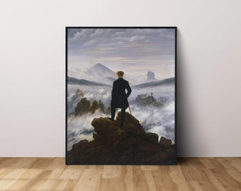 May include: A painting of a man standing on a rocky outcrop, looking out over a sea of clouds. The sky is a pale blue, and the clouds are white and fluffy. The man is wearing a dark coat and a hat. The painting is framed in black.
