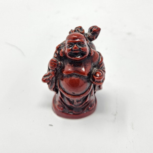 Miniature Cherry Resin Laughing Buddha with Bead & Sack