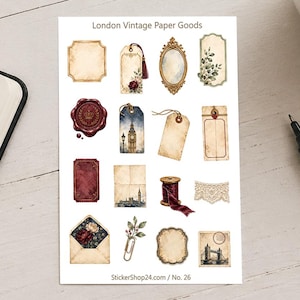 Könnte beinhalten: Ein Stickerbogen mit dem Titel London Vintage Paper Goods, der verschiedene Illustrationen zeigt, darunter verzierte Rahmen, Geschenkanhänger, ein Wachssiegel, eine Spule mit dunkelrotem Band, eine Spitzenborte, eine Londoner Skyline und einen Umschlag.