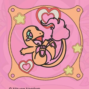May include: A pink and orange cartoon frame with a yellow star and a pink heart. Inside the frame is a cartoon orange and pink creature with a pink tail and a heart in its mouth. The text "© kitsune kingdom" is at the bottom of the image.
