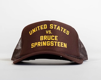 Gorra trucker Estados Unidos vs. Bruce Springsteen