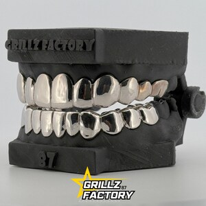 Minimalist platinum plain grillz - understated luxury for your smile