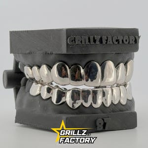 14K gold plain dental grillz custom molded for perfect fit