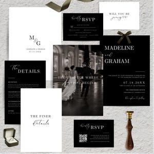 May include: A wedding stationery suite featuring black and white cards, including an invitation with a photo of a couple, RSVP cards with QR codes, a details card, and a wax seal stamp. The text includes names Madeline and Graham, dates, and event details.