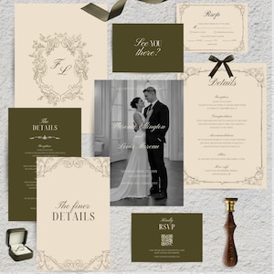 May include: A wedding stationery suite featuring cream and olive green cards with ornate borders, including an RSVP card, a details card with text, a photo card of a couple, and a wax seal stamp. A small black ring box with a ring is also included.