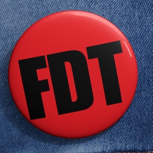 FDT Protestnål: Knapp med politiskt uttalande