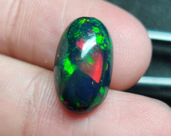 Äthiopischer Schwarzopal Cabochon, ovaler Edelstein (16X9X6 MM, 4.55 Carat)
