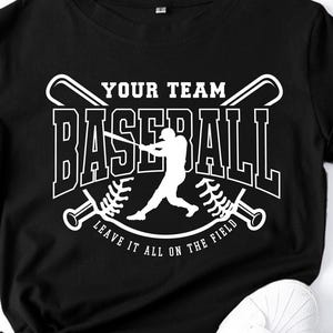 May include: Black t-shirt with a white graphic design of a baseball player with bats crossed behind the player. The text reads "Your Team Baseball Leave It All On The Field."