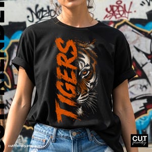 Tiger mascot sublimation PNG with orange and white sports graphics
