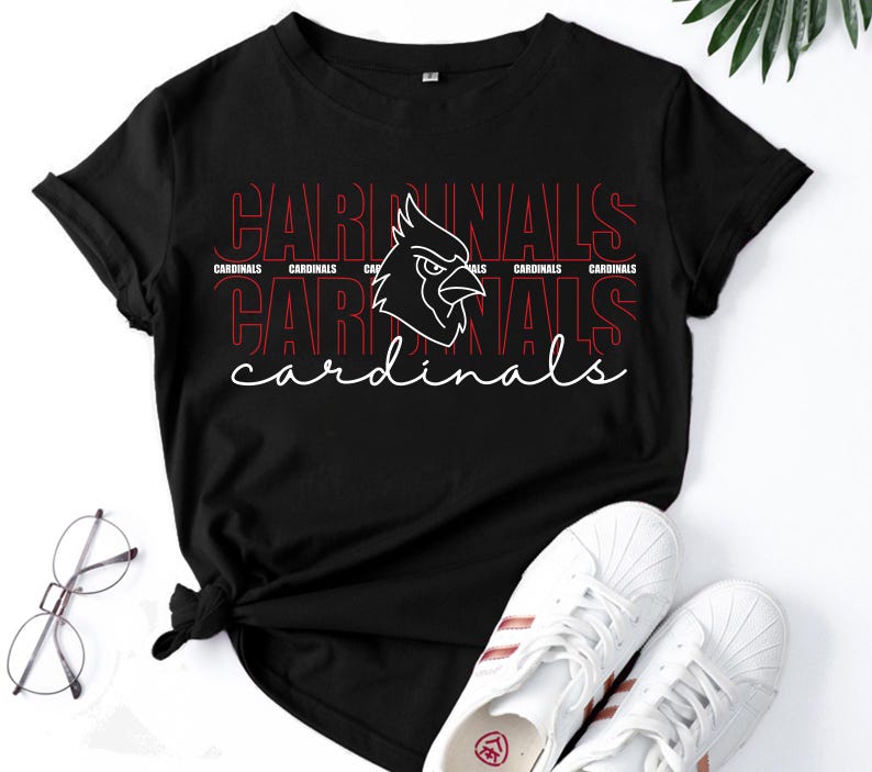 Cardinals mascot face design with stacked typography for school spirit apparel