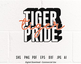 May include: Black and white graphic design with the text "TIGER" in large letters and "tiger" in cursive script above the word "PRIDE" in large letters. The text is in a 3D style with a shadow effect.