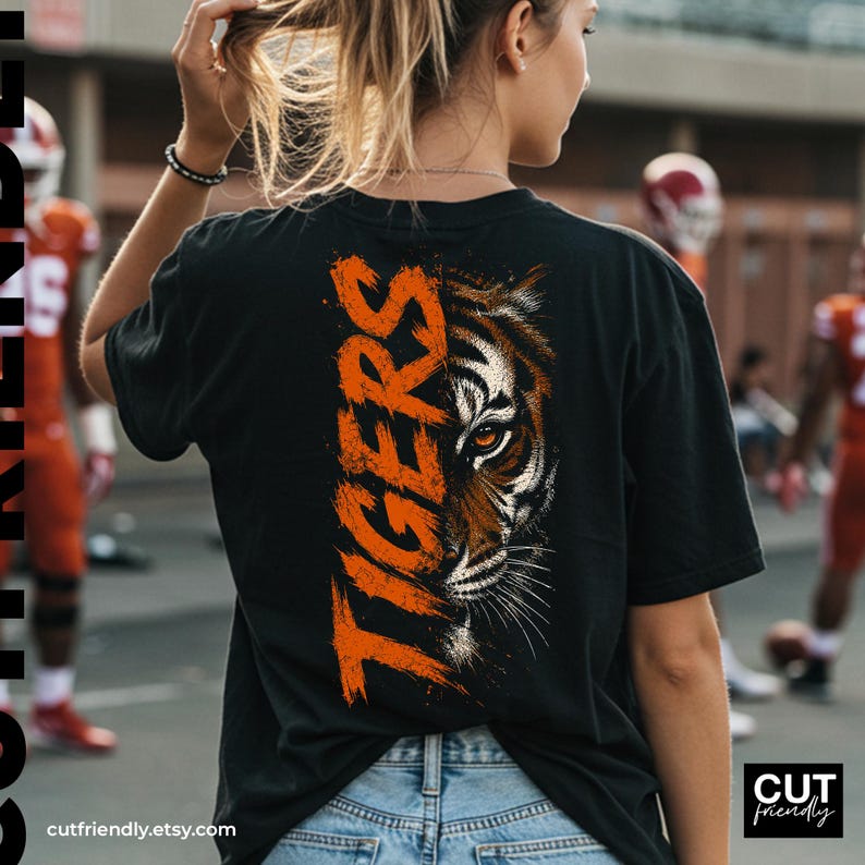 Tigers mascot PNG featuring a fierce tiger face and distressed varsity lettering