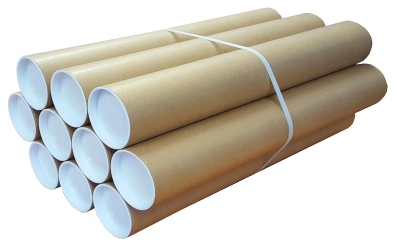 May include: A bundle of cylindrical cardboard tubes, each with a tan exterior and a white interior. The tubes are secured together with a white plastic strap. The tubes are likely for shipping or storage of rolled items.