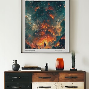 May include: A poster of the animated film "Howl's Moving Castle" by Studio Ghibli. The poster features a fiery image of the castle in the sky with a small figure standing in the foreground. The text "Howl's Moving Castle" is at the top of the poster, and the text "Studio Ghibli" and "となりのトトロ" are at the bottom.