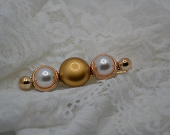 one gold hairclip with white pearls, elegant stylish bridal style barrette