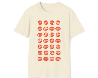 May include: A cream-colored t-shirt with a red circle pattern featuring the names of various restaurants and shops. The names are in a retro font style.