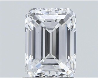 May include: A clear, emerald-cut diamond with a rectangular shape. The facets reflect light, creating a brilliant sparkle. The gemstone is set against a plain, light background, highlighting its clarity and cut. This diamond is suitable for jewelry.