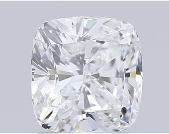 May include: A brilliant-cut, cushion-shaped diamond. The gemstone is clear and colorless, with numerous facets that reflect light. The diamond's shape is square with rounded corners, and it appears to be set against a neutral background.