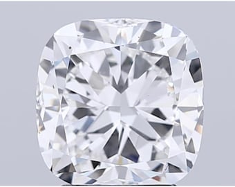 May include: A close-up of a cushion-cut diamond. The diamond is clear and colorless, with many facets that reflect light. The shape is square with rounded corners, and the overall appearance is brilliant.