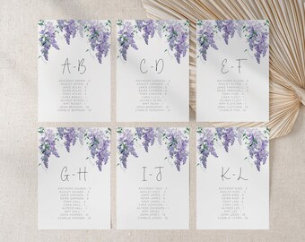 Op de afbeelding: Zes witte kaarten met een bloemenontwerp van paarse blauwe regen bloemen. Elke kaart heeft een lettercombinatie en een lijst met namen. De kaarten zijn gelabeld met A-B, C-D, E-F, G-H, I-J en K-L.
