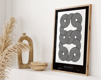 May include: Black and white abstract geometric print with the word "BALANCE" in a black frame. The print is on a white background and features a series of overlapping circles.