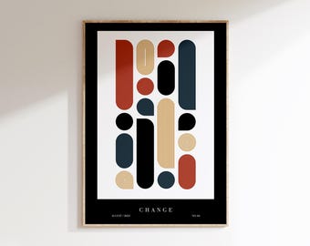 May include: Abstract geometric art print with a black background and a white center. The print features a variety of shapes in red, blue, and gold. The text "CHANGE" is printed at the bottom of the print.