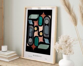 May include: A framed art print featuring an abstract design with geometric shapes in teal, brown, black, and gold. The word "HARMONY" is printed at the bottom. The artwork is displayed on a woven shelf with a vase of white flowers.