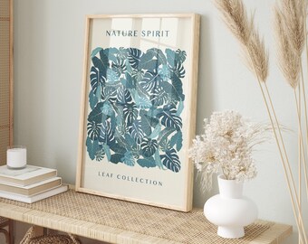 May include: A framed print with a nature-inspired design featuring a collection of blue and green leaves. The print is titled "Nature Spirit Leaf Collection".