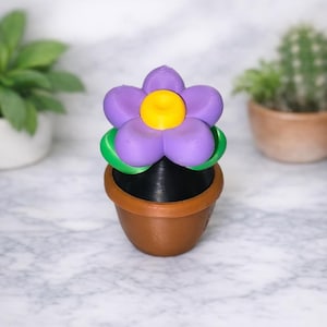 Organizador de escritorio floral: la belleza de las flores se une al almacenamiento funcional.