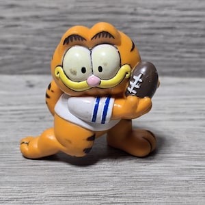 1981 Garfield Katze Fußball spielend 2.25" PVC Actionfigur