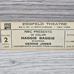 May include: A vintage ticket for the NBC show "Haggis Baggis" starring Dennis James at the Ziegfeld Theatre in New York City on Thursday, April 2, 1959. The show was presented in color and the doors closed at 5:45 PM.