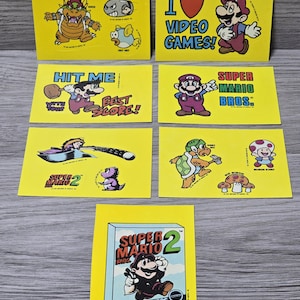 1989 Topps Nintendo Williams SUPER MARIO Bros Adesivo Cartão Lote de 7 MINT