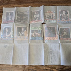 May include: A set of three ceramic mugs with a speckled, matte finish. The mugs are in shades of cream, light gray, and dark gray. Each mug has a simple, minimalist design, perfect for coffee or tea.