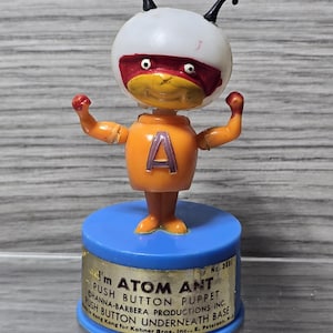 Jaren 60 Vintage Atom Ant-drukknop speelgoed Kohner Bros Hanna Barbera Hong Kong