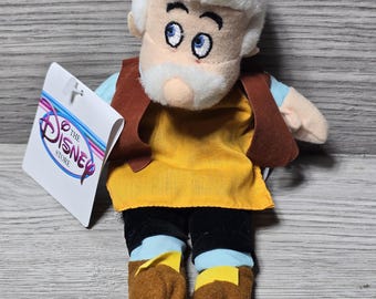 1980年代のディズニーのピノキオのジミニー・クリケットのぬいぐるみ