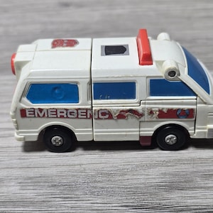Figura de acción del robot Autobot Transformers G1 de 1985, PRIMEROS AUXILIOS, Protectobots, Takara