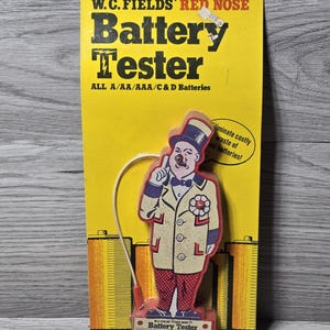 Probador de baterías W.C. Fields Red Nose de 1974, sellado, nuevo sin usar.