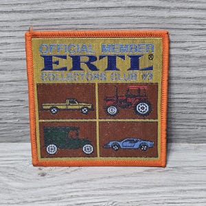 May include: Orange and gold embroidered patch with the text "OFFICIAL MEMBER ERTL COLLECTORS CLUB #4". The patch features four small images of toy vehicles, including a truck, tractor, car, and a vintage car.