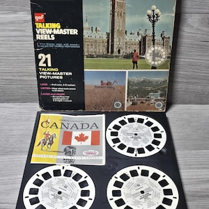 May include: A vintage GAF Talking View-Master Reels set, themed around Canada. The box displays a Canadian Parliament building. The set includes 21 talking View-Master pictures, a booklet, and three reels, all presented on a black tray.