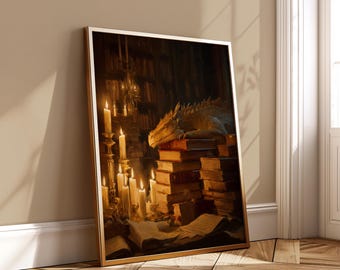 May include: A framed print depicts a dragon resting on a stack of books in a library, illuminated by candlelight. The artwork features a gold frame and a warm color palette, creating a cozy and inviting atmosphere. The dragon is a light tan color.