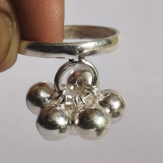 Handcrafted Sterling Silver Ball Ring: Dangling Charm, High Polish