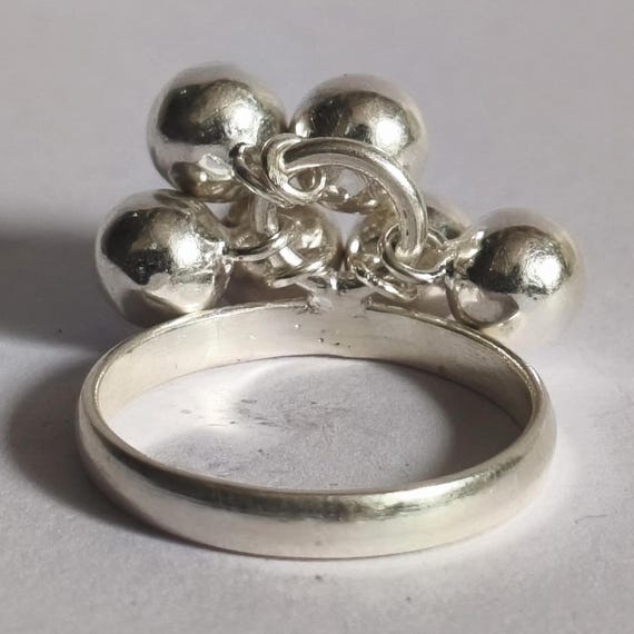 Handcrafted Sterling Silver Ball Ring: Dangling Charm, High Polish