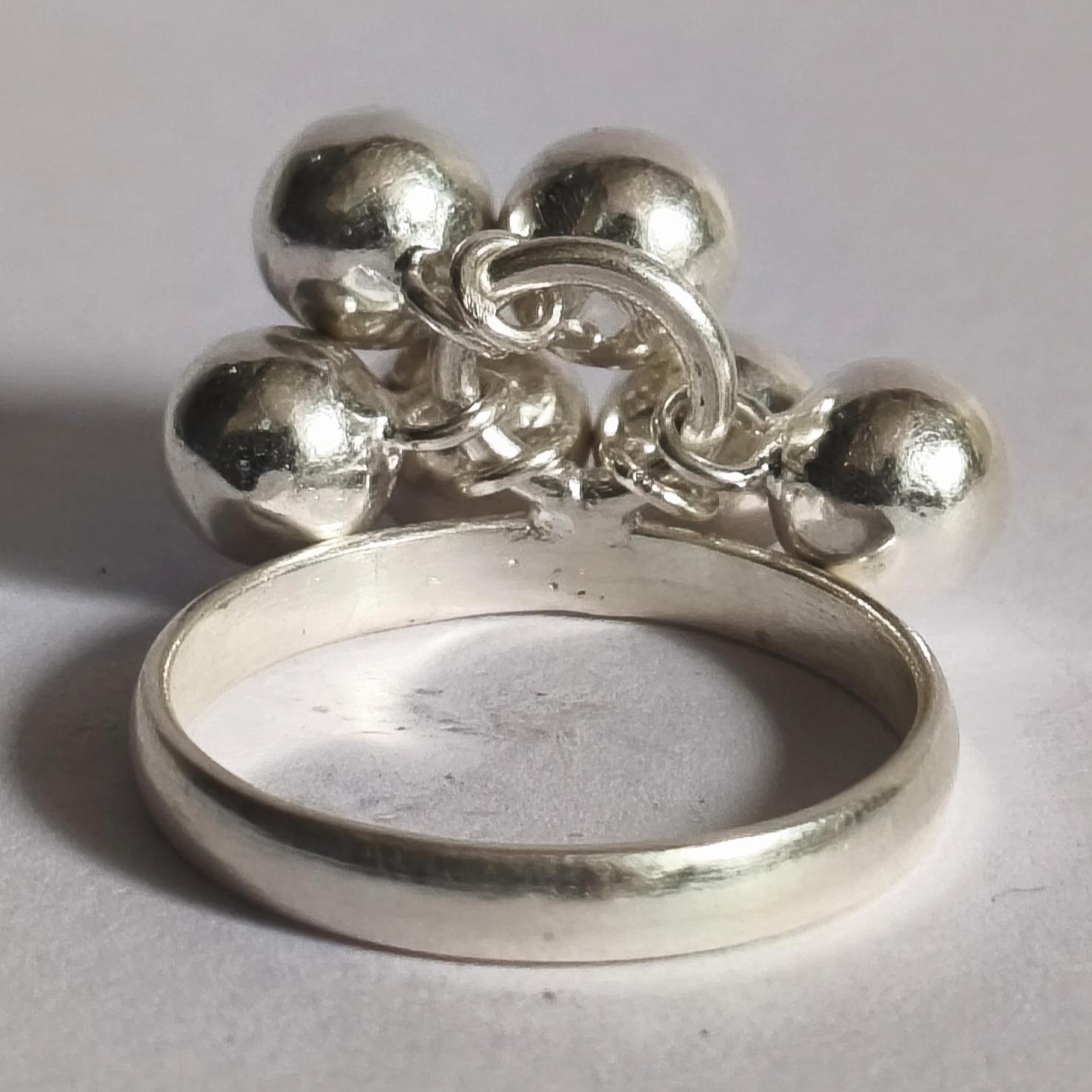 Handcrafted Sterling Silver Ball Ring: Dangling Charm, High Polish