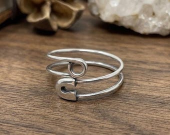 Handgemaakte sterling zilveren wikkelring, verstelbare, subtiele statement ring.